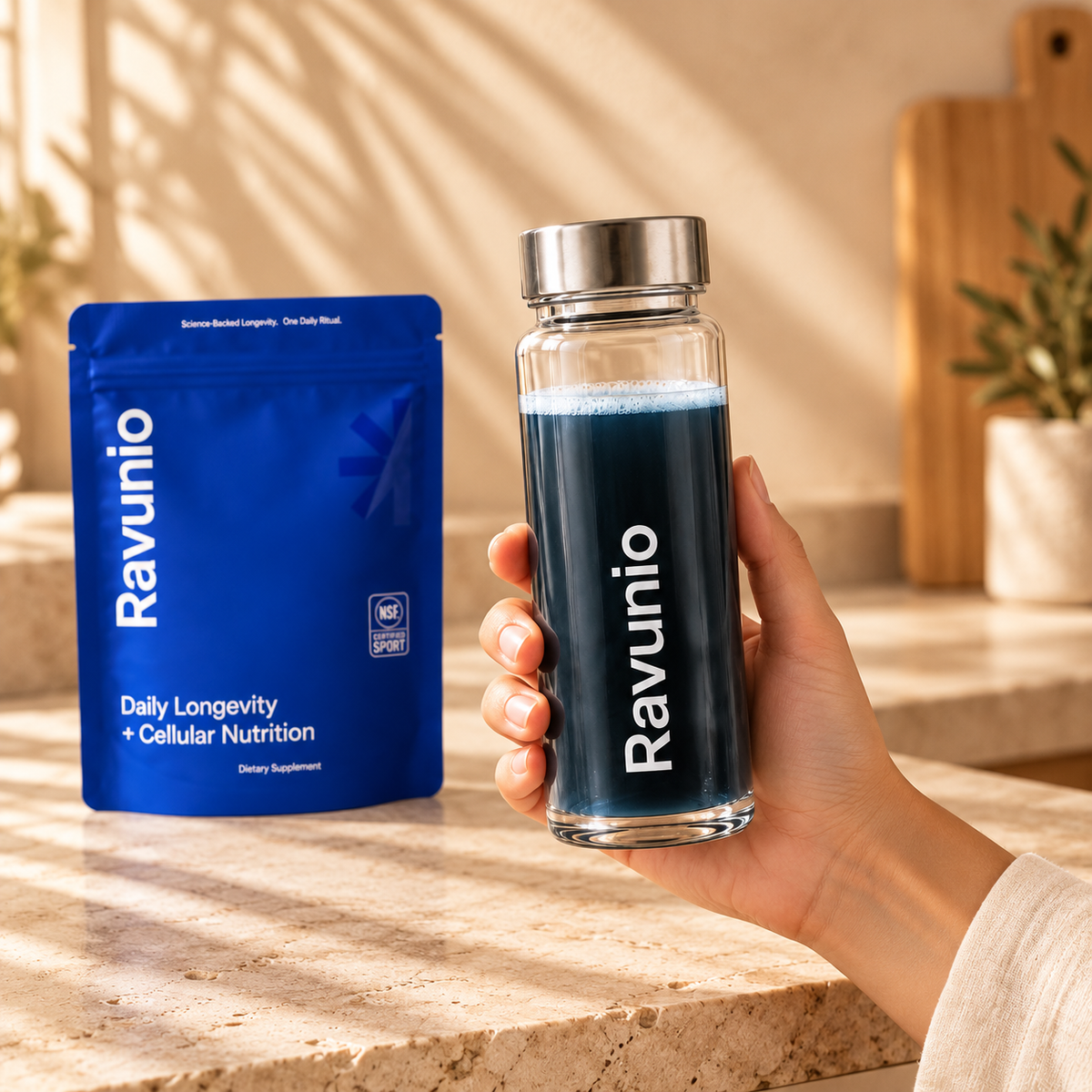 Holding the Ravunio bottle next to the pouch